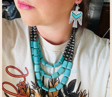 Turquoise Leather Laced Thunderbird Earrings
